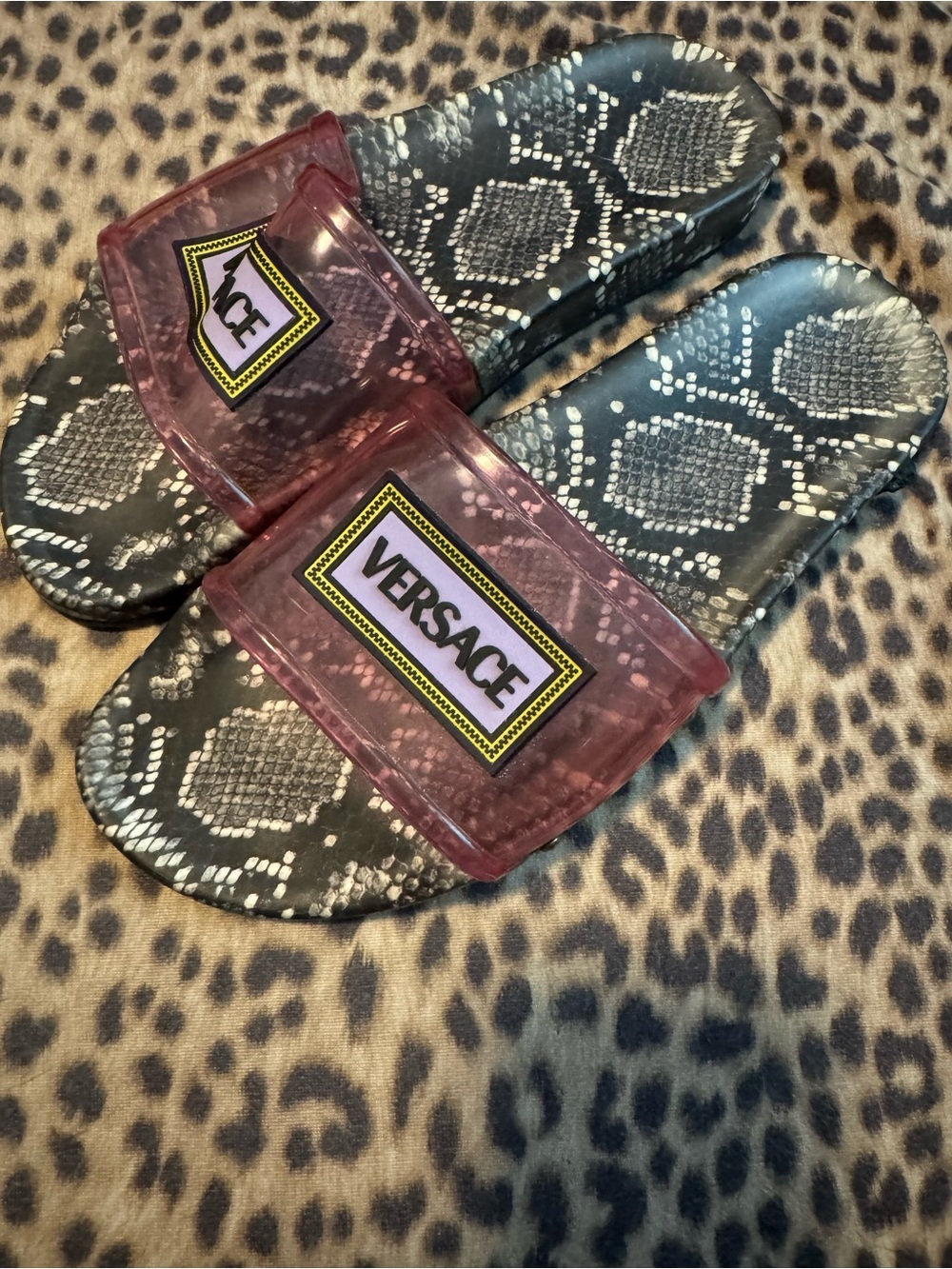 Versace Pink Transparent Logo Slide Sandals with Black Snake-Print Footbed